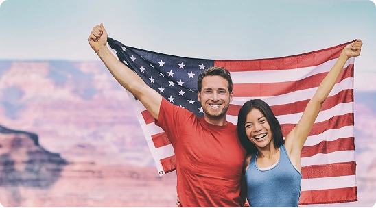 A couple celebrates after successfully attaining a green card.