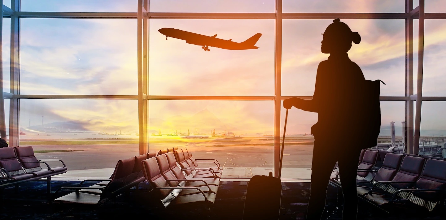 Traveler at airport preparing to move to the United States